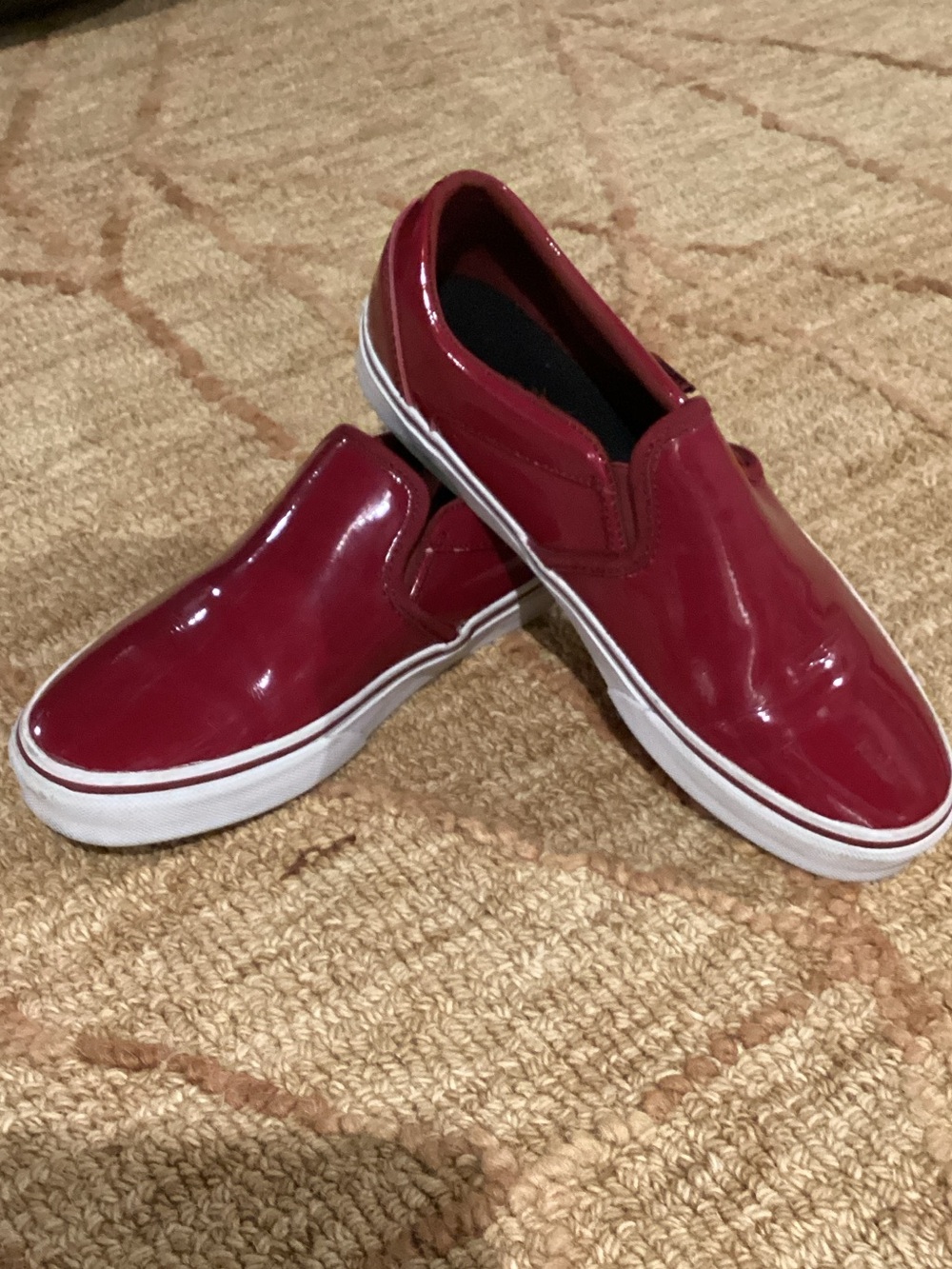 Vans Women's Slip-On Sneakers in Glossy Cherry Red